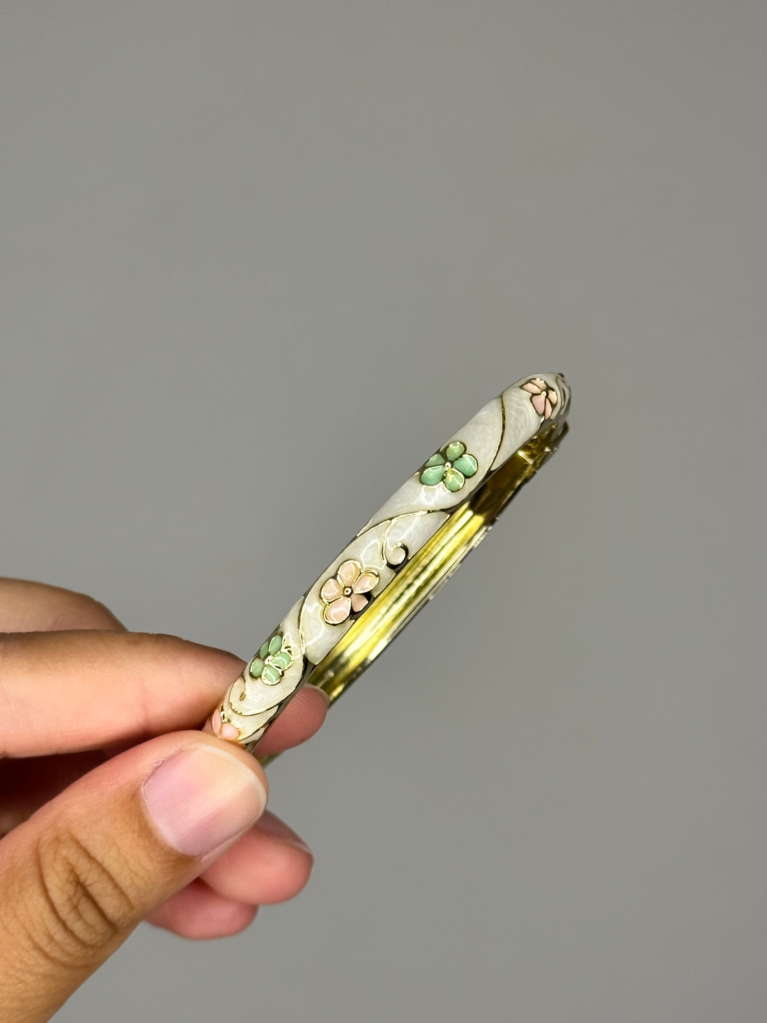 White with pink and green flowers